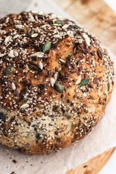 a loaf of bread with seeds on it