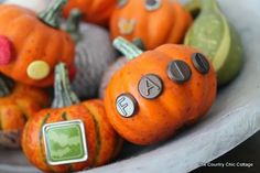 there are many small pumpkins in the bowl