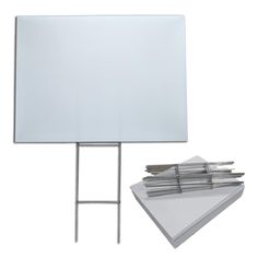 a white board and some papers on a stand