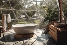 a bath tub sitting inside of a bathroom next to a window filled with greenery