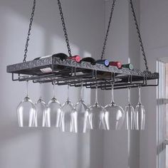 a rack with wine glasses hanging from it