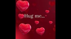 red hearts with the words hug me in white text on a red background that says,