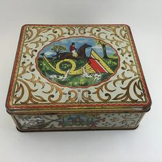 a decorative box with an image of a horse and rider on the front, sitting on a white surface