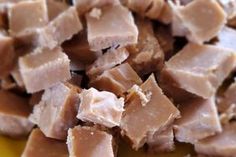 chopped meat sitting on top of a yellow plate