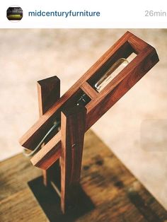 a small wooden sculpture on top of a table