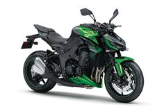 a green and black motorcycle on a white background