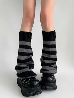 Step back into the iconic Y2K era with these stylish Striped Knit Flare Leg Warmers. Crafted with a cozy knit material, these leg warmers feature a retro striped pattern. The flared design at the bottom provides a unique silhouette. Casual Knit Leg Warmers For Cold Weather, Trendy Ribbed Knit Leg Warmers, Casual Ribbed Leg Warmers For Winter, Casual Striped Leg Warmers For Winter, Casual Striped Leg Warmers For Fall, Trendy Black Ribbed Leg Warmers, Winter Fitted Leg Warmers For Streetwear, Fitted Leg Warmers For Winter Streetwear, Casual Black Knit Leg Warmers