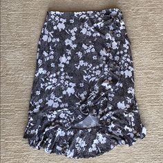 Nwt Michael Michael Mors Black/White Floral Midi Faux Wrap Skirt In Size S. This Skirt Sits Up At The Waist Giving A Cute Look To Your Outfit Of The Day. There’s A Zipper On The Side Of The Dress Right Behind The Wrapper Knot. You Can Always Adjust The Knot Of The Wrap Skirt. The Skirt On The Top Is About 14” So It Can Sit High Or Right On Your Hips. Material Is 95% Polyester And 5% Elastin. Wrapper Skirt, Business Casual Skirt, Navy Midi Skirt, Navy Blue Pencil Skirt, Black Floral Skirt, Faux Wrap Skirt, Silk Midi Skirt, Midi Flare Skirt, Houndstooth Skirt