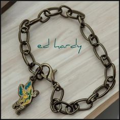 Ed Hardy Blue Butterfly Charm Bracelet On Gunmetal Gray Stainless Steel Chain With Lobster Clasp Closure Length Approximately 8" Get This Unique, Super Rare Ed Hardy Butterfly Bracelet While You Still Can!! Check Out My Other Ed Hardy Jewelry! Ed Hardy Jewelry, Butterfly Charm Bracelet, Butterfly Bracelet, Gunmetal Grey, Butterfly Charm, Ed Hardy, Blue Butterfly, How To Get Rich, Steel Chain