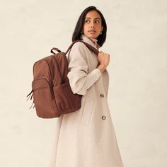 Travel smart and stylishly with our Large Bancroft Backpack. Designed for the modern traveler/commuter/student who values both form and function, this spacious backpack offers ample storage space, organizational features and a sleek design that makes it the perfect companion for your adventures near and far. Whether you're embarking on an international trip, weekend getaway, attending classes, or just doing the everyday work thing, our backpack offers the perfect combination of style, functional Women’s Backpack, Stylish Backpacks For Women, Wearing Backpack, Work Backpack Women, Adventurous Lifestyle, Leather Backpack Women, International Trip, Travel Smart, Boho Backpack