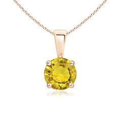 The round yellow sapphire is held in a prong setting and connected to a glistening plain bale. This solitaire pendant is crafted in 14k rose gold and draws all the attention towards its bright hue. Sapphire Solitaire, Sapphire Pendant, Solitaire Pendant, Yellow Sapphire, Elegant Gift, 18k Rose Gold, Prong Setting, Sapphire, Gold Necklace