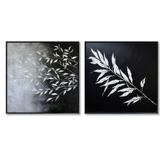 two black and white paintings with leaves on them