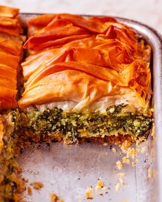 a close up of a pie on a pan