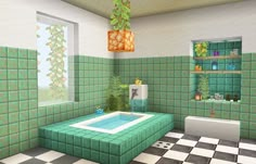 a bathroom with green tiled walls and flooring