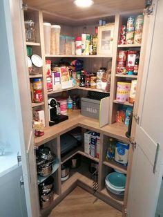 an open pantry with lots of food in it