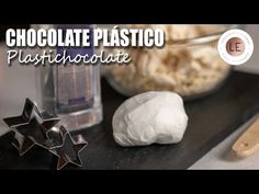 chocolate plasticio plasthoolatee with star shaped cookie cutters next to it