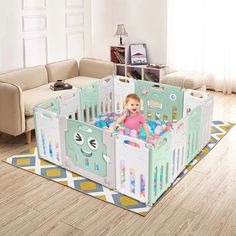 there is a baby in a crib on the floor