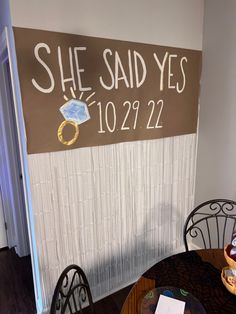 there is a sign that says she said yes to her husband on the side of the wall