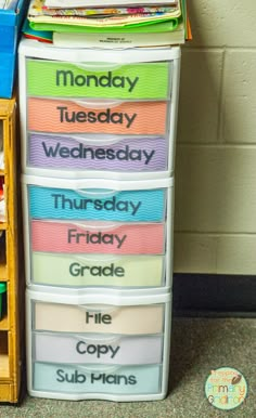 an organized classroom file cabinet with the words monday, wednesday, friday and friday written on it