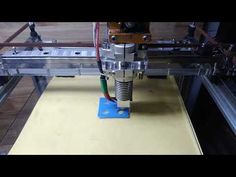 a machine that is working on something yellow