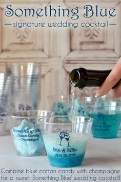 someone is pouring something blue into small cups