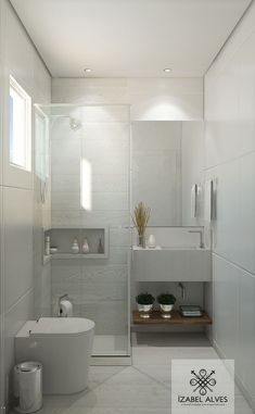 a bathroom with a toilet, sink and bathtub in white tiled floor to ceiling walls