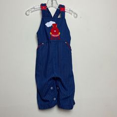 Pre-Owned Vintage Healthtex train overalls. Size 12 Months Machine Washable. Approx. Measurements: Refer to Pictures. Please see pictures the straps have a small stitch keeping them at the length they are, should be able to be removed easily. Sleeveless Jumpsuits With Pockets For Playtime, Retro Spring Overalls With Bib Front, Sleeveless Cotton Overalls For Playtime, Vintage Spring Overalls With Bib Front, Retro Cotton Shortalls With Bib Front, Vintage Overalls With Suspenders, Vintage Cotton Bib Front Jumpsuits And Rompers, Vintage Sleeveless Overalls With Pockets, Vintage Sleeveless Jumpsuit With Pockets