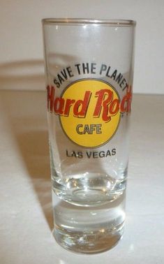 a shot glass with the words hard rock cafe on it and las vegas written in red