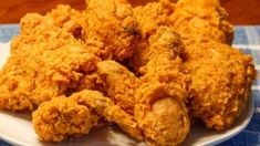 some fried food on a white plate on a table