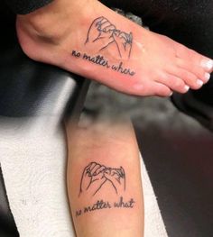 two people with tattoos on their feet that say no matter what they are holding hands