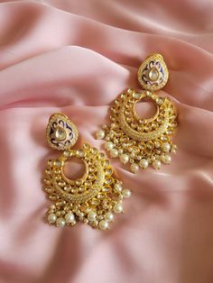 Chandbali Indian Pakistani gold wedding earring jewelry Plated in high  quality  gold plating are beautiful, elegant & will surely galvanize you, because our products are unique, comfortable, fashion forward & very popular for the rich look.  *High quality craftsmanship 100% satisfaction guarantee  *Plated in Gold plating *Earring Closure push back *base metal for Earring is copper * Earring length 11cm *package include pink gold earrings  *ready to ship from Houston TX United States GIFT- It comes in gift box perfect for gifting to your mom , sister, in laws, friends, on there birthday, wedding , bridal shower, anniversary, festival , and many more... Discover a variety of Necklace sets and Earring  only at Azzashiny.fj . our product are made from metal & alloys like Copper or Brass respe Gold Meenakari Chandbalis Drop Earrings, Gold Round Meenakari Chandelier Earrings, Gold Meenakari Chandbali Danglers, Gold Meenakari Chandbalis, Gold Meenakari Chandbali Bridal Earrings, Gold Meenakari Chandbalis Dangle, Bollywood Style Gold Chandbali Bridal Earrings, Gold Chandbalis With Cutdana In Drop Shape, Gold Kundan Hoop Earrings In Bollywood Style