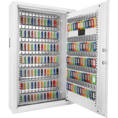 an open white box with many different colored items in it's doors and shelves