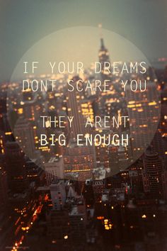 a cityscape with the words if your dreams don't scare you they aren't big enough