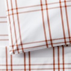 an orange and white checkered sheet set