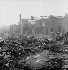 an old black and white photo of destroyed buildings