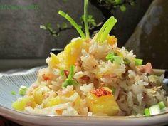 a plate with rice and vegetables on it