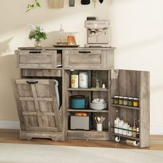 a wooden cabinet with doors open on the floor