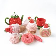 crocheted teapots and cups with strawberries on them