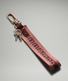 a keychain with the word'birmingham'on it and two keys attached to it