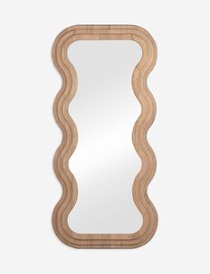 a wooden frame mirror with wavy shapes on the front and sides, against a white background