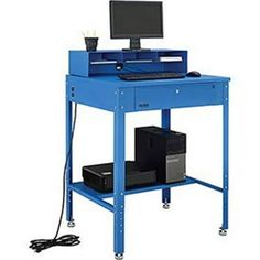 a blue workbench with a computer on it