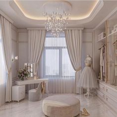 an elegant bedroom with white furniture and chandelier hanging from the ceiling, along with a round ottoman