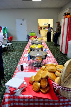 a long table topped with lots of food