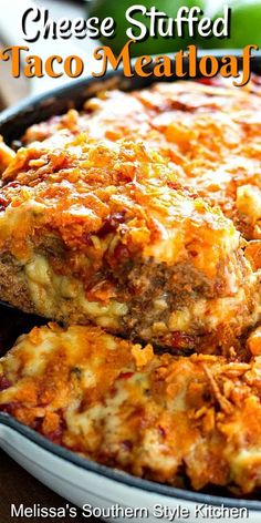 cheese stuffed taco meatloaf is shown in a pan with the words, cheese stuffed taco meatloaf