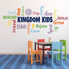 a child's playroom with colorful wall decals