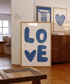 there is a large blue love sign in the room