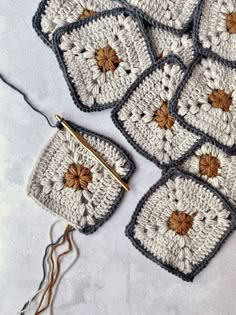 several crocheted grannys are arranged on a table