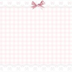 a pink and white checkered background with a bow