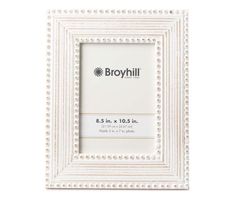 a white frame with beading on the edges and an inscription that says broyrhill