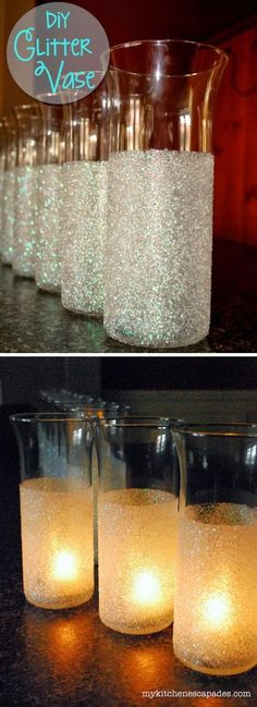 candles are lit in glass vases with glitter on the top and bottom one is filled with water